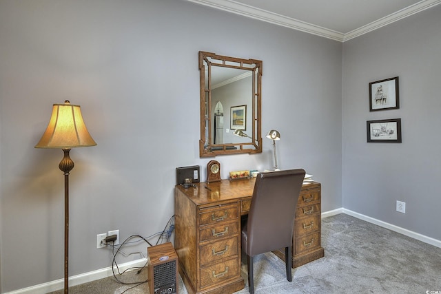 carpeted home office with ornamental molding and baseboards