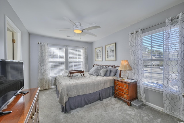 bedroom featuring carpet, visible vents, ceiling fan, and baseboards