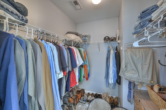 spacious closet featuring visible vents