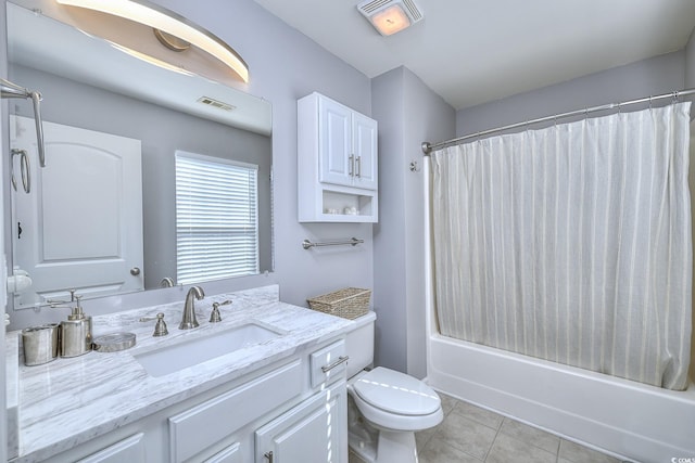 bathroom with toilet, shower / bath combo with shower curtain, tile patterned flooring, and visible vents