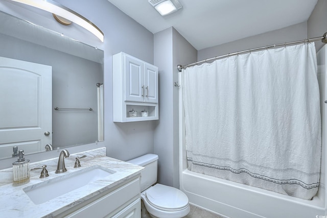 full bathroom featuring vanity, toilet, and shower / bathtub combination with curtain