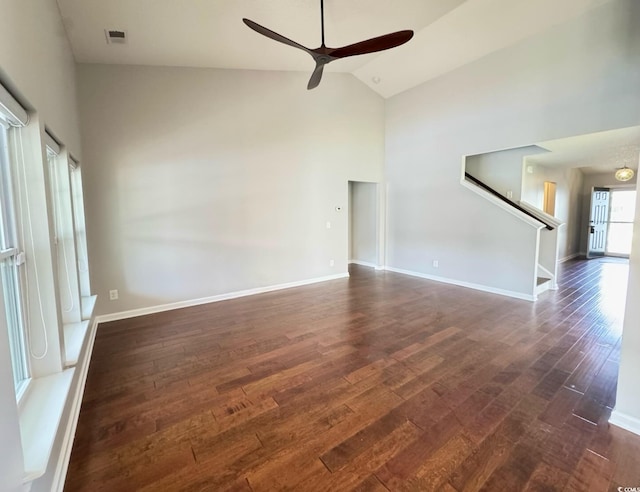 556 Cedar Lakes Dr, Little River, SC 29566 - unfurnished living room featuring a ceiling fan, high vaulted ceiling, and dark wood-type flooring