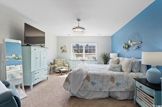 carpeted bedroom with a textured ceiling