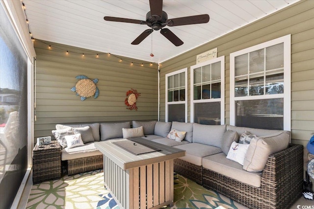 deck featuring a ceiling fan and an outdoor living space