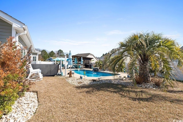 view of swimming pool featuring a fenced in pool