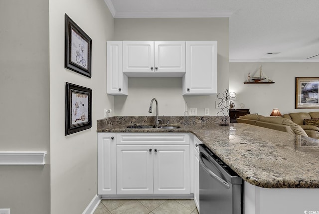 kitchen with a sink, dishwasher, dark stone countertops, a peninsula, and light tile patterned floors
