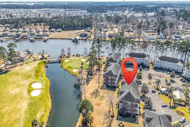 bird's eye view featuring a residential view, view of golf course, and a water view