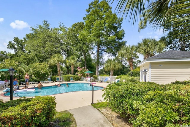 community pool with a patio