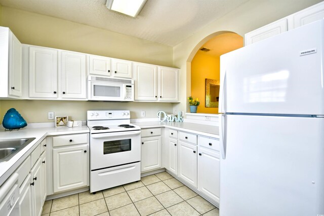 5801 Oyster Catcher Dr Unit 723, North Myrtle Beach, SC 29582 - empty room with ceiling fan, a textured ceiling, baseboards, wood finished floors, and visible vents