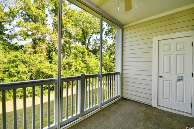 balcony featuring a ceiling fan