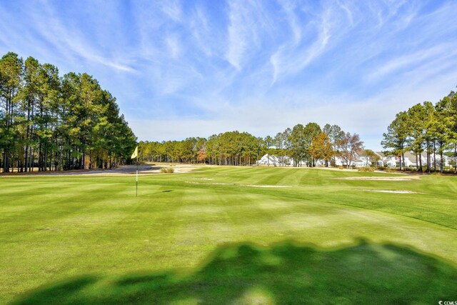 5801 Oyster Catcher Dr Unit 723, North Myrtle Beach, SC 29582 - surrounding community featuring golf course view and a yard