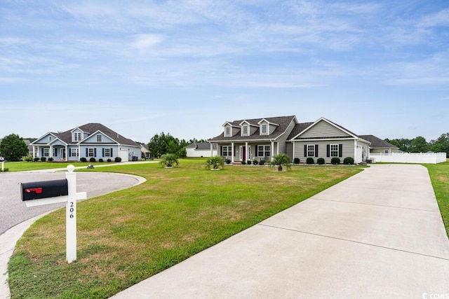 view of front of home featuring driveway and covered porch