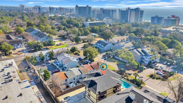 birds eye view of property with a view of city