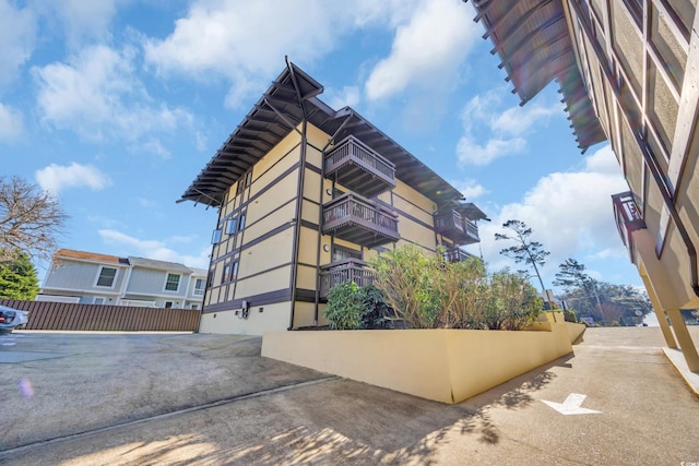 view of property featuring fence