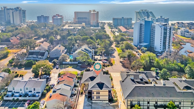 aerial view with a water view and a view of city