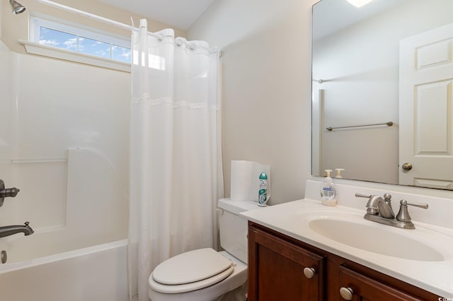 full bath featuring shower / bath combo, vanity, and toilet