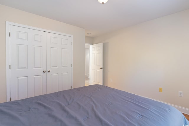 unfurnished bedroom with a closet