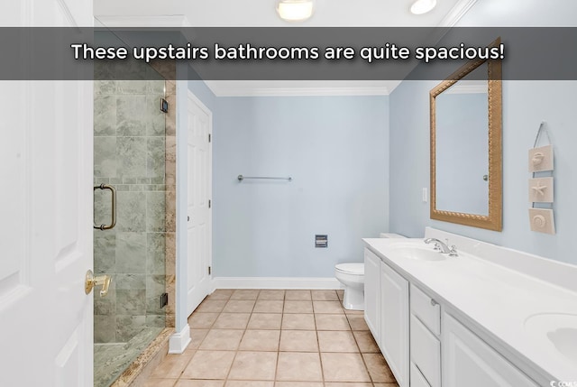 bathroom with tile patterned flooring, toilet, a sink, ornamental molding, and a shower stall