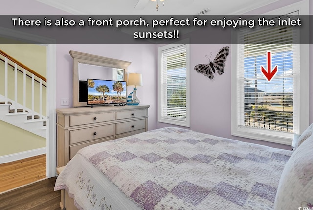 bedroom with dark wood-style floors, baseboards, and visible vents