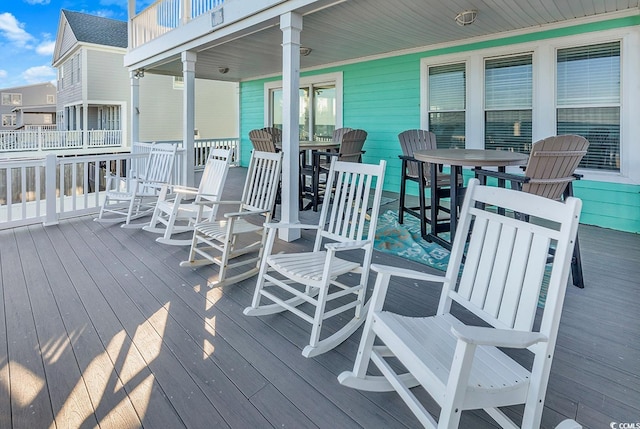 deck with outdoor dining space