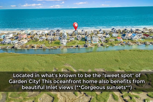 aerial view featuring a water view and a residential view