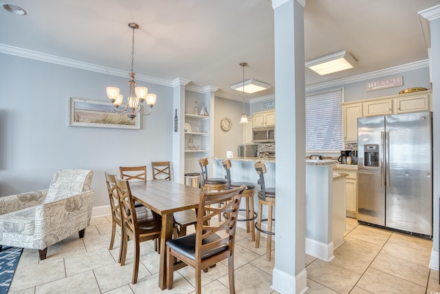 dining area featuring ornamental molding and light tile patterned flooring