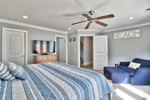 carpeted bedroom featuring baseboards, visible vents, crown molding, and recessed lighting