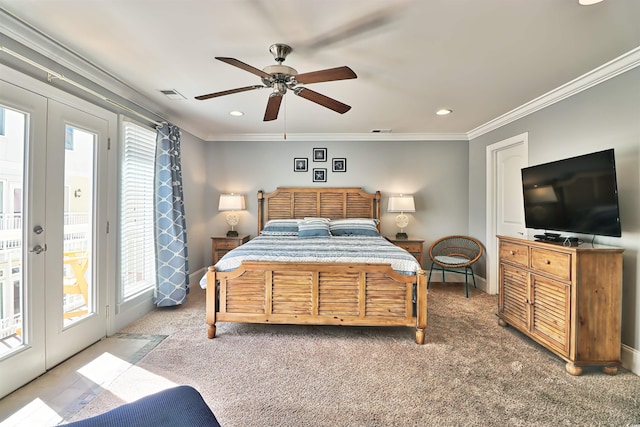 carpeted bedroom with ornamental molding, access to outside, french doors, and visible vents