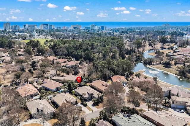 drone / aerial view with a water view