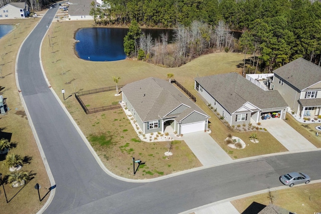 drone / aerial view featuring a water view