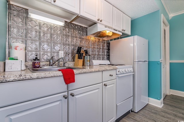 kitchen featuring white cabinetry, a sink, a textured ceiling, white range with gas stovetop, and under cabinet range hood