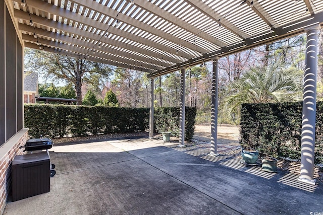 view of patio / terrace featuring fence and a pergola