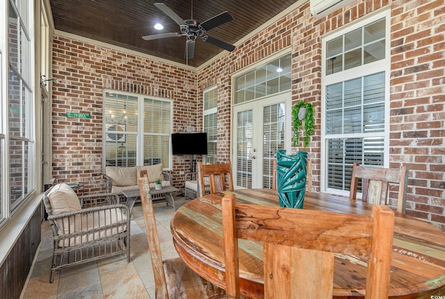 view of patio with ceiling fan, french doors, outdoor lounge area, and a wall unit AC