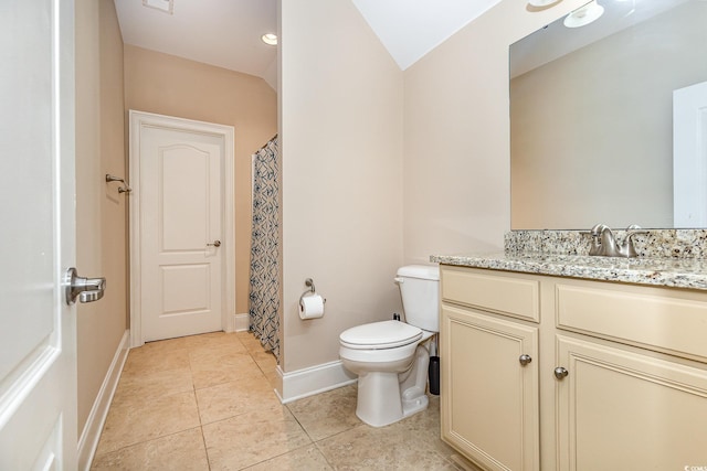 full bathroom with curtained shower, tile patterned flooring, toilet, vanity, and baseboards