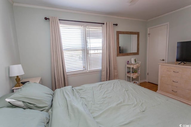 bedroom featuring crown molding