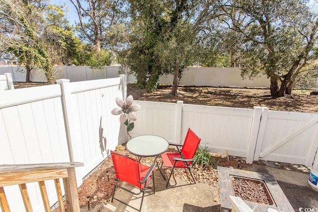 view of patio / terrace with outdoor dining area and a fenced backyard