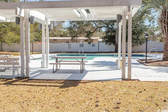 view of swimming pool featuring a patio area, a fenced backyard, a fenced in pool, and a pergola