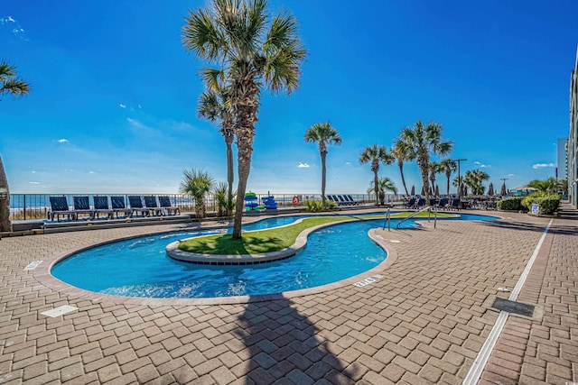 pool with a patio