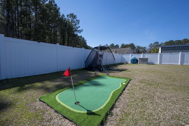 view of yard with a fenced backyard