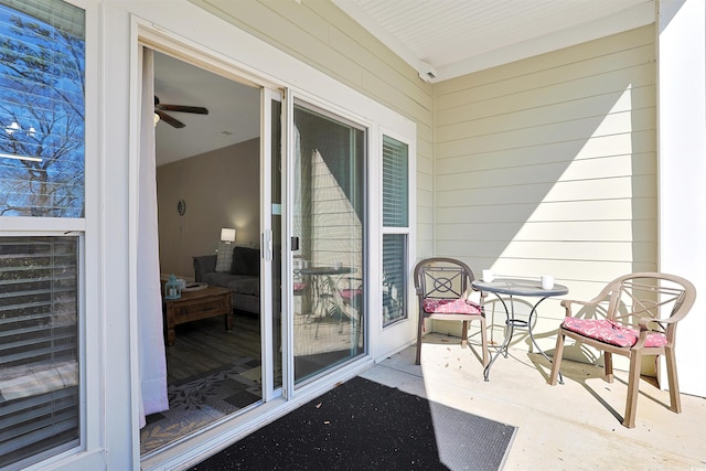 exterior space featuring ceiling fan