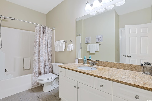 bathroom featuring shower / tub combo with curtain, vanity, toilet, and tile patterned floors