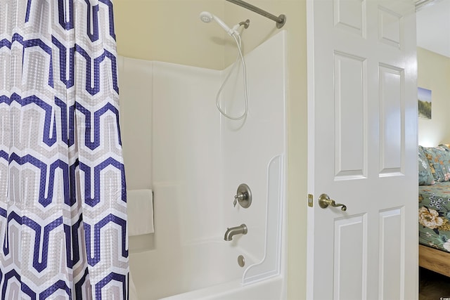 bathroom featuring shower / bathtub combination with curtain