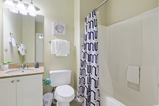 bathroom featuring vanity, toilet, and shower / bathtub combination with curtain