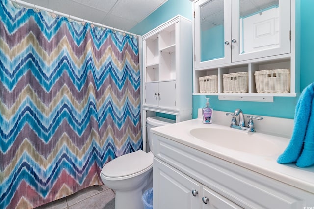 bathroom with vanity, tile patterned flooring, toilet, and a shower with curtain