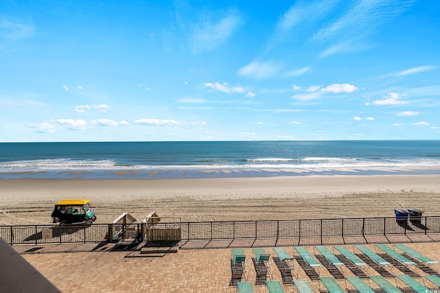 property view of water featuring a beach view