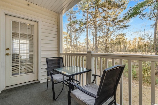 balcony featuring outdoor dining space