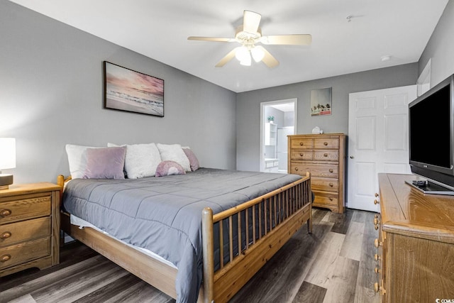 bedroom featuring ceiling fan, ensuite bathroom, and wood finished floors