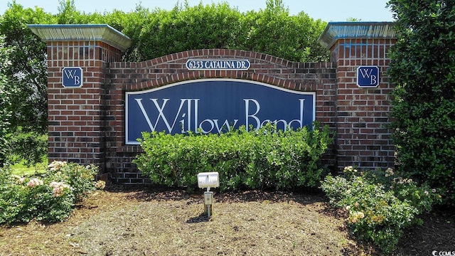 view of community sign