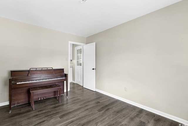 sitting room featuring wood finished floors and baseboards