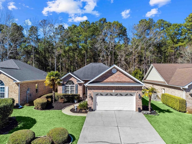 single story home with an attached garage, driveway, brick siding, and a front yard